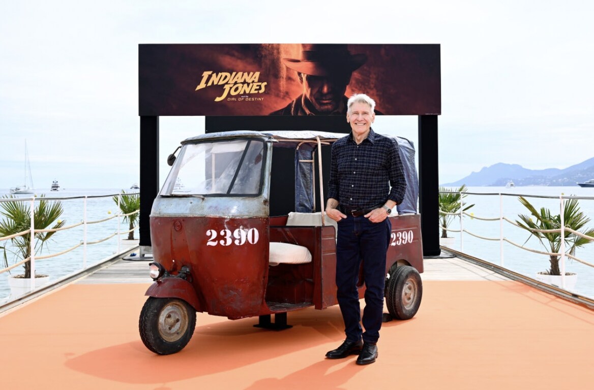 Harrison Ford stood in front of Tuk Tub at Indiana Jones and the Dial of Destiny Photo call in Cannes.