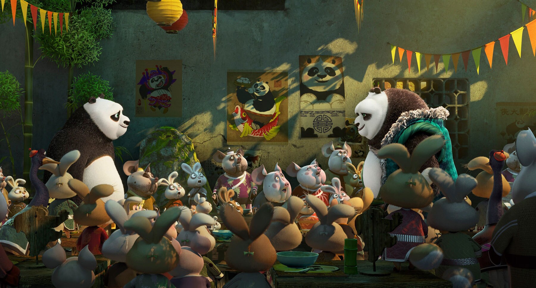 Po (Jack Black) and Li (Bryan Cranston) talking to a room full of animals in the movie "Kung Fu Panda 3"