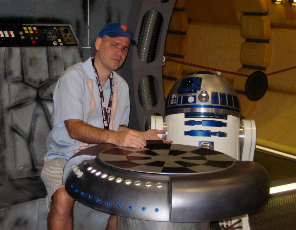 Jason Fry on the Millennium Falcon with R2-D2 at Star Wars Celebration.