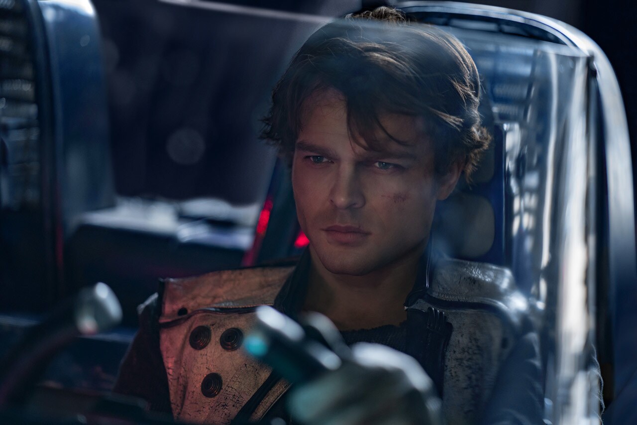 Han Solo pilots a speeder in Solo: A Star Wars Story.