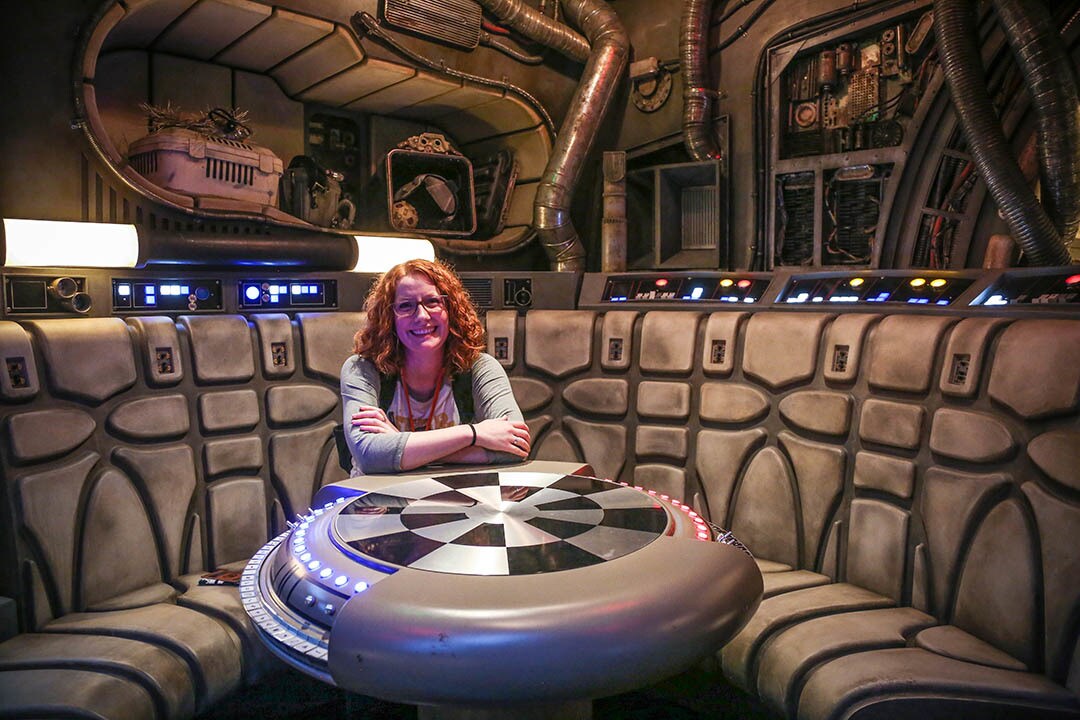 Kristin Baver takes a seat inside the Millennium Falcon at Star Wars: Galaxy's Edge.