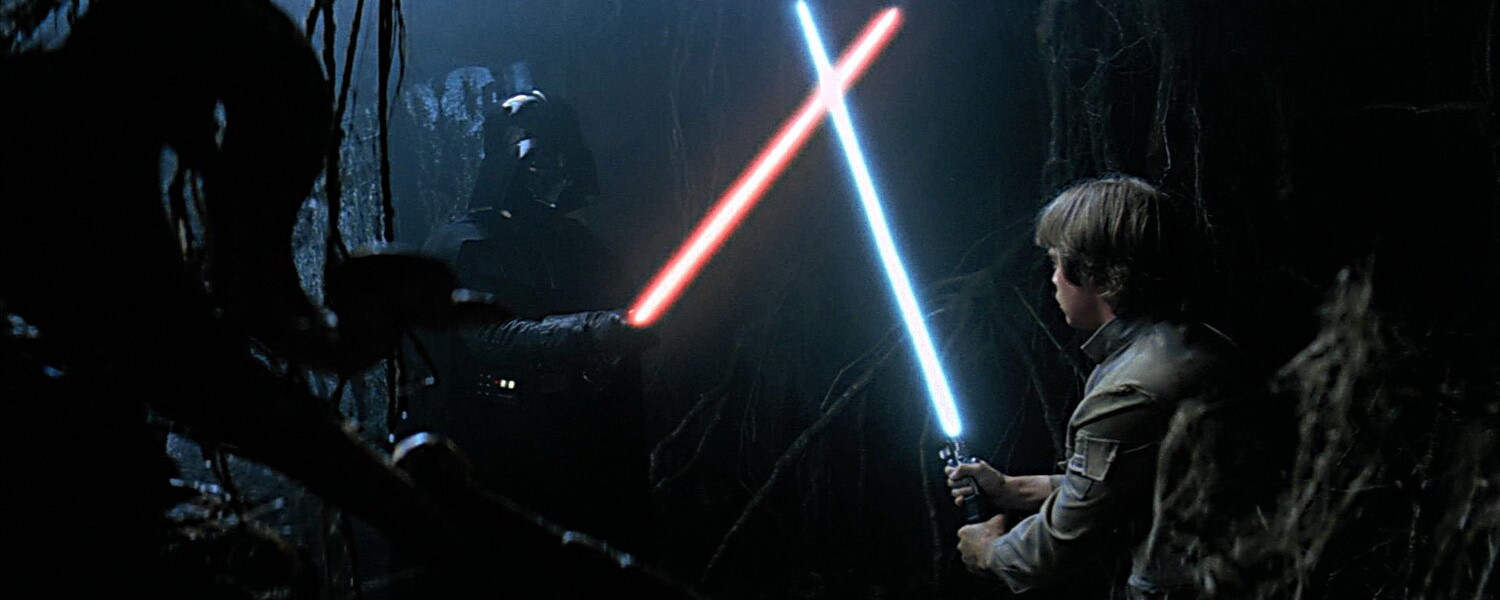 Luke Skywalker dueling a Darth Vader apparition in the Cave of Evil