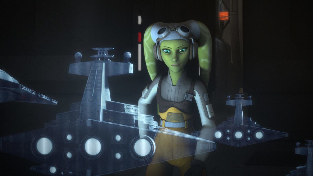 Hera Syndulla looks at a holographic projection of several Imperial star destroyers in Star Wars Rebels.
