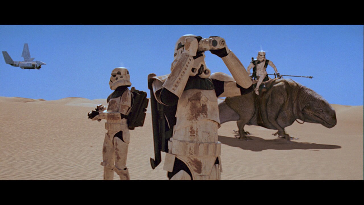 Locating the empty escape pod the next day, stormtroopers on Tatooine search for the missing droi...