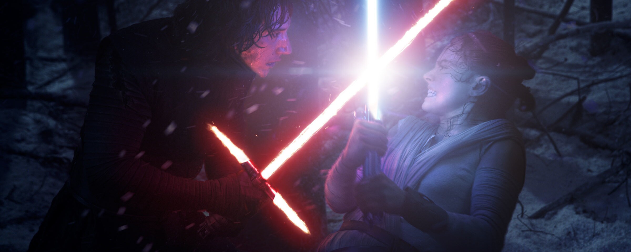 Kylo Ren fights Rey in a lightsaber duel.