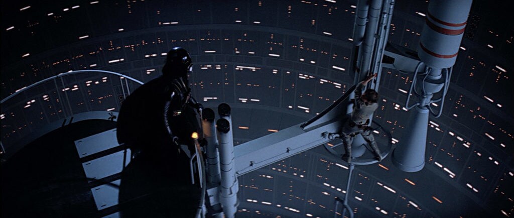 Darth Vader looms over a defeated Luke Skywalker on Cloud City.