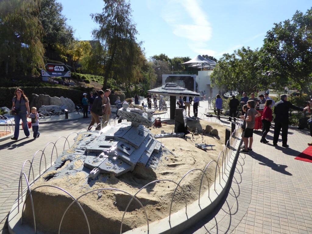A model of a crashed Star Destroyer in sand, at Legoland California.