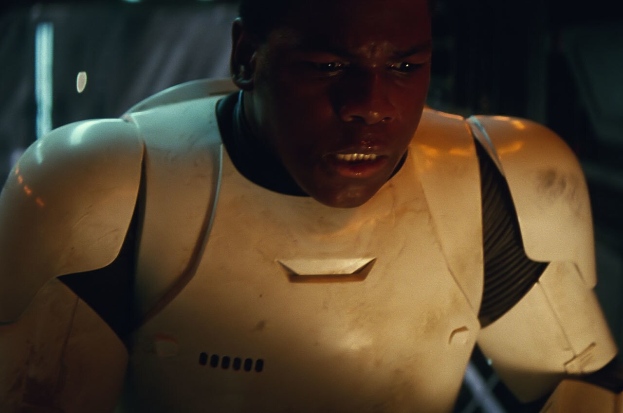 Finn wearing stormtrooper armor.