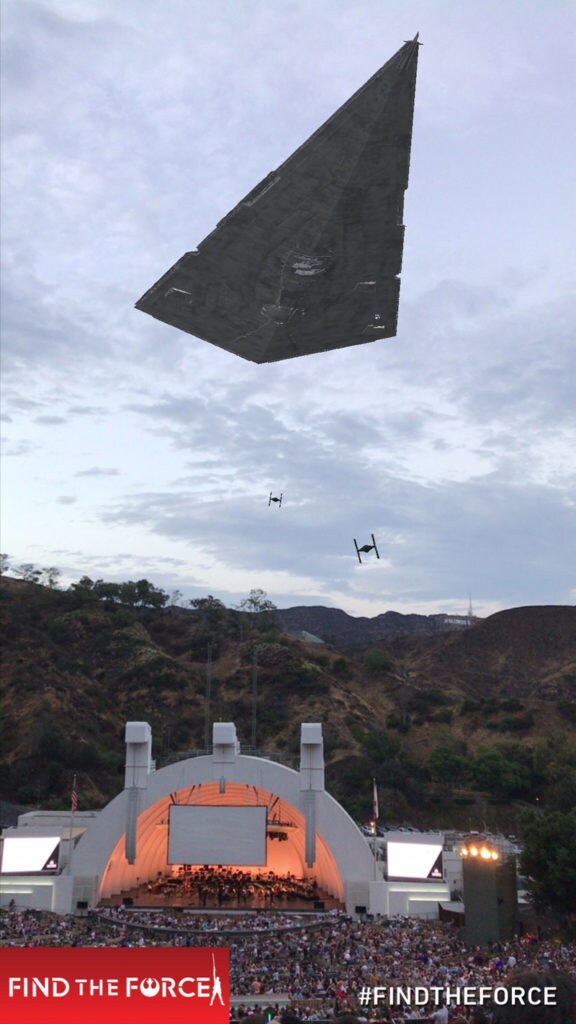 A computer generated Star destroyer and TIE fighters above the Hollywood Bowl from Find the Force, an augmented reality scavenger hunt game.