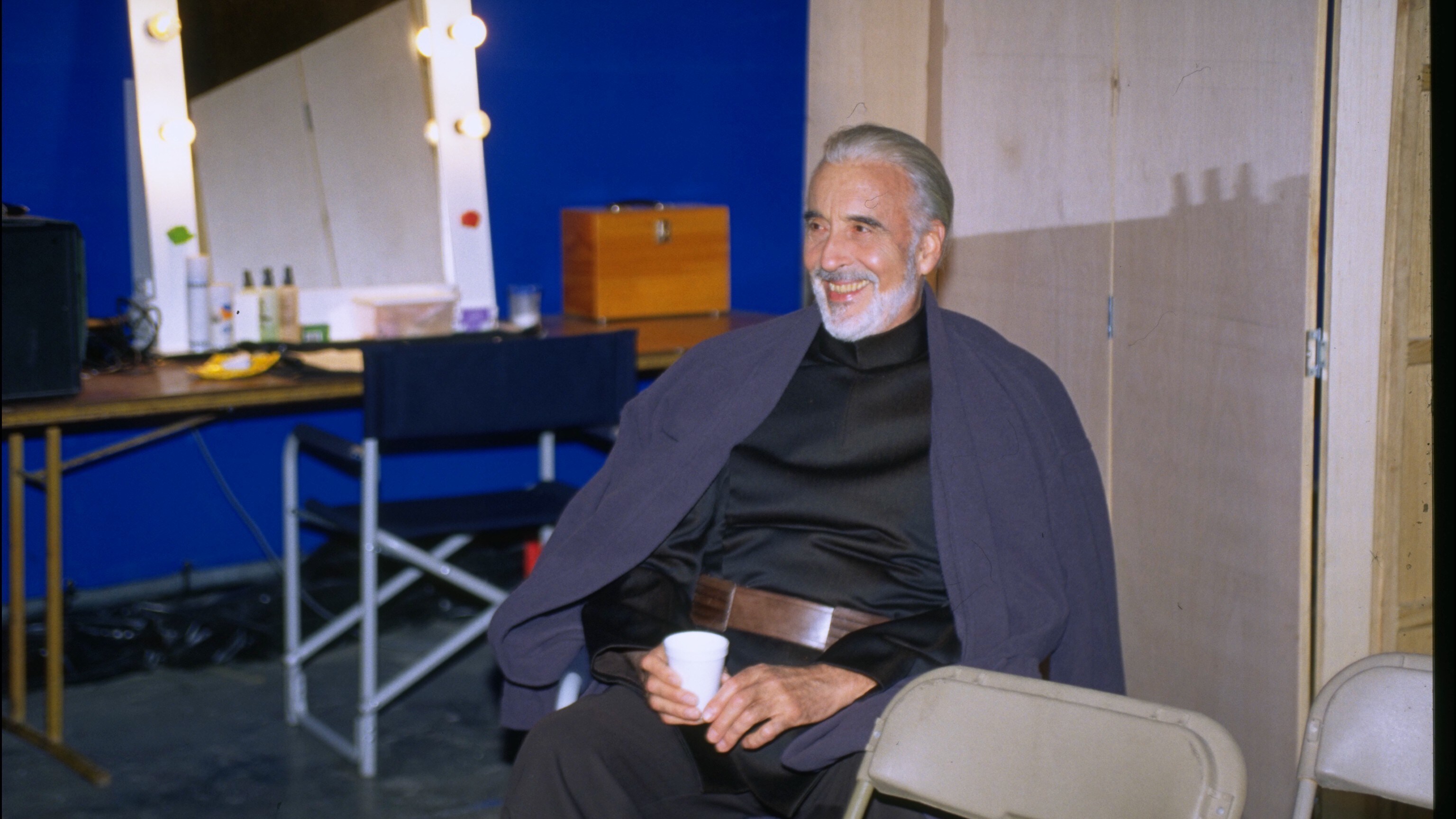 Christopher Lee relaxes on the Attack of the Clones set