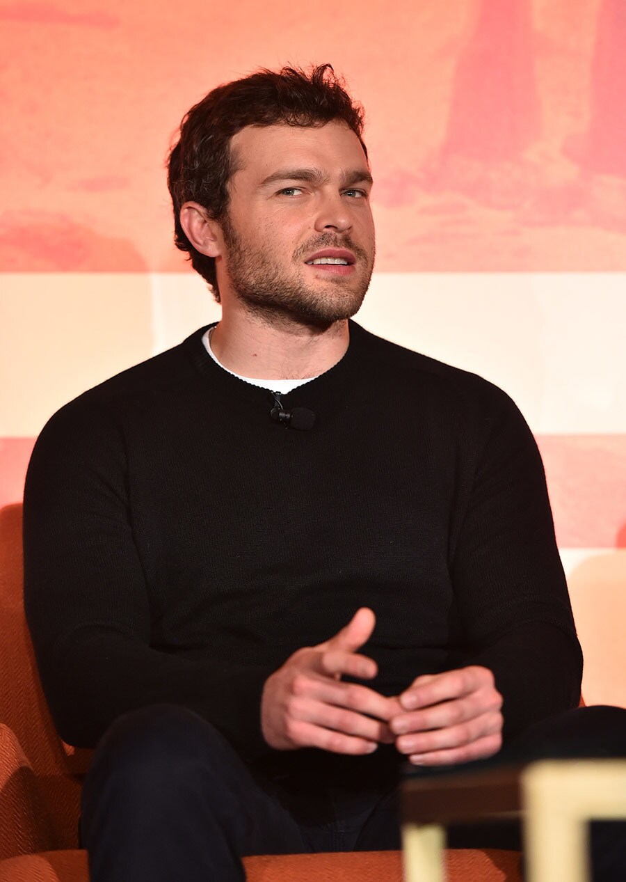 Alden Ehrenreich, who plays young Han Solo, speaks on stage at a press even for Solo: A Star Wars Story.