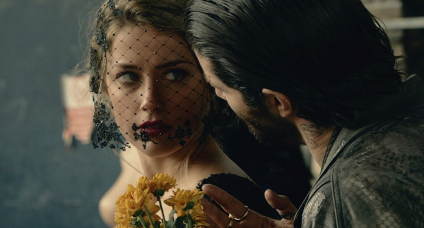 Amber Heard (as Nicola Six), and Theo James (as Guy Clinch) in "London Fields"