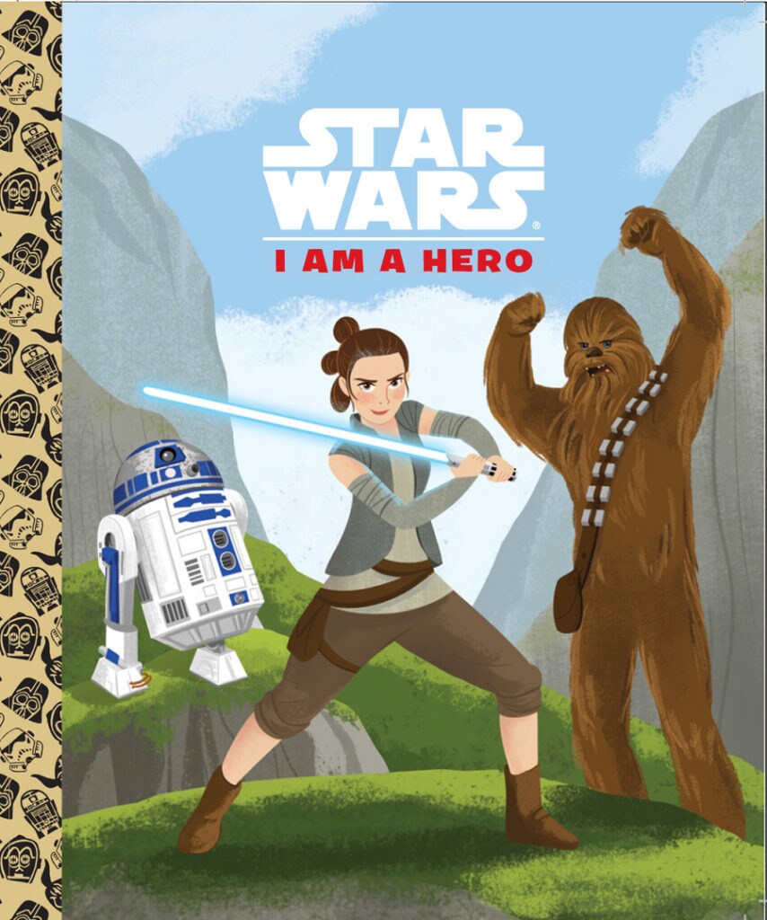 The cover of the book Star Wars: I am a Hero features Rey, wielding a lightsaber, R2-D2, and Chewbacca.