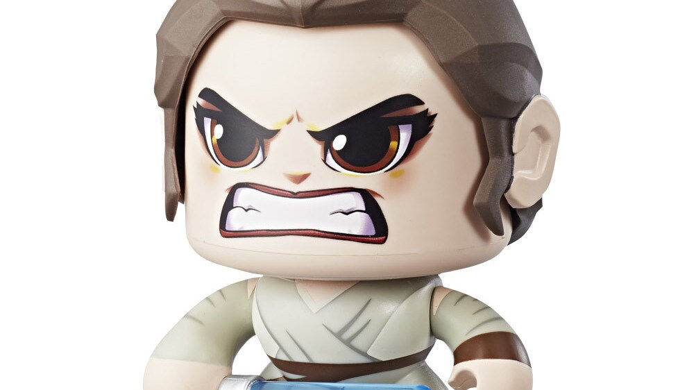 A Rey Mighty Muggs collectible figure with lightsaber.