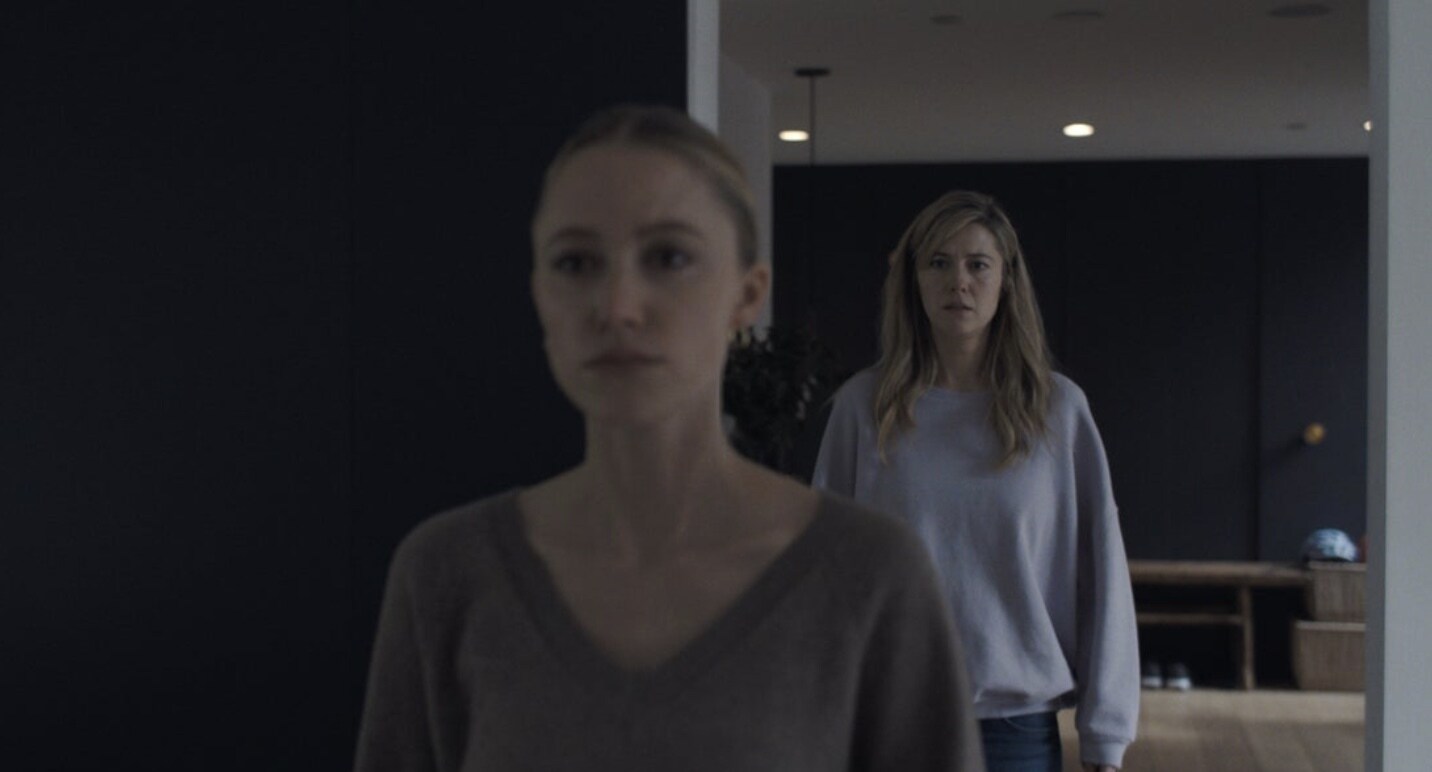 The Hand That Rocks the Cradle Logos and Key Art Film Still