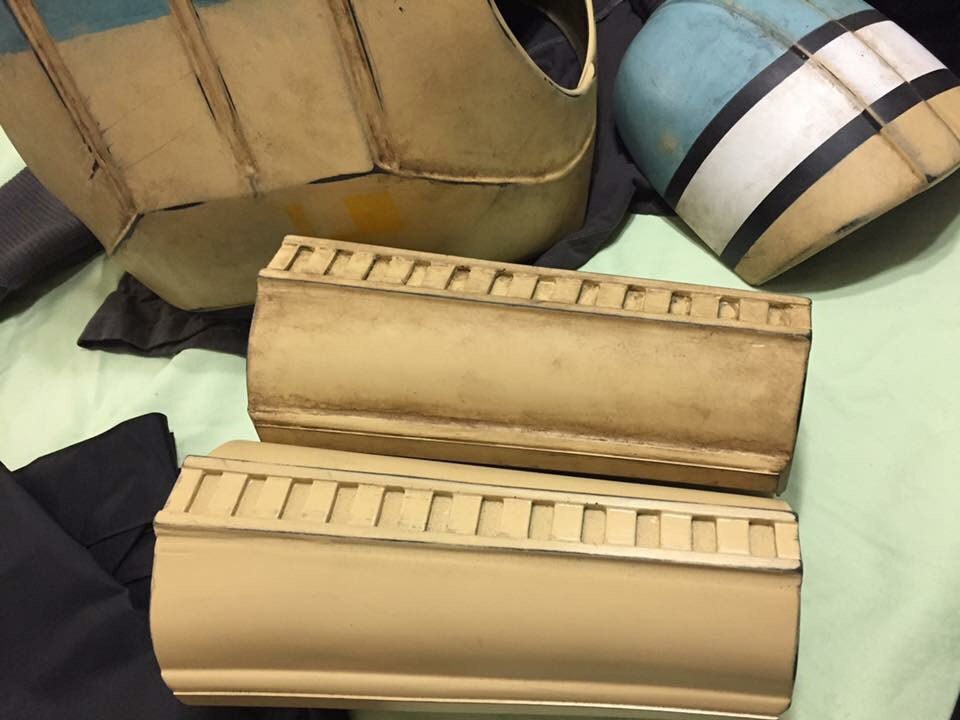 Several parts of an unfinished shoretrooper cosplay costume await assembly.