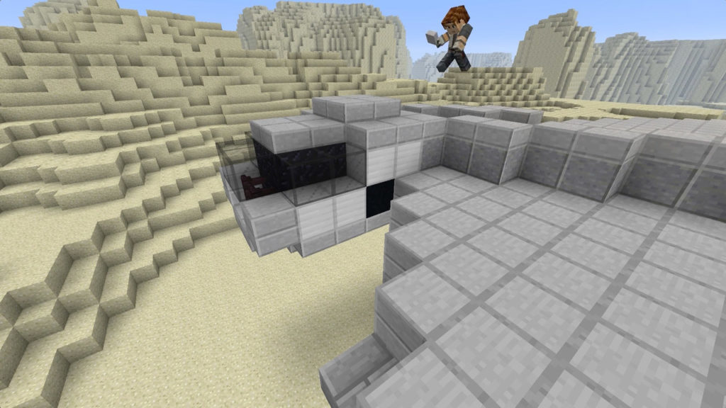 A Minecraft character runs on top of a Millennium Falcon built in Minecraft.