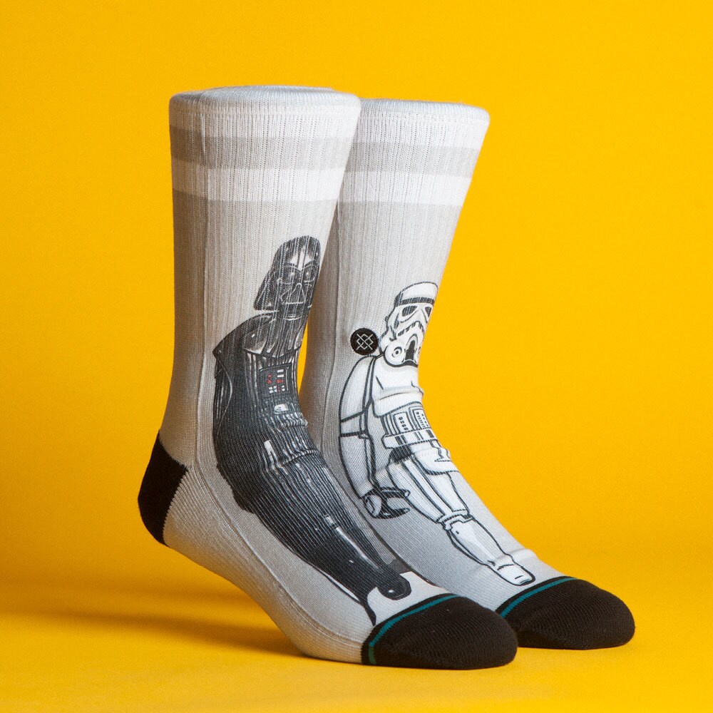 A pair of Star Wars-themed socks by California-based clothing brand Stance. One sock features Darth Vader while the other features a stormtrooper.