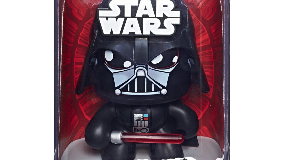 A packaged Darth Vader Star Wars Mighty Muggs collectible figure holds a lightsaber.