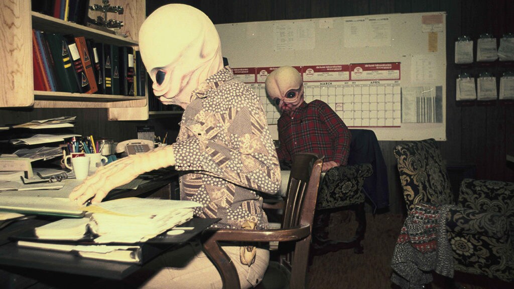 Lucasfilm employees wear masks from alien costumes for A New Hope.