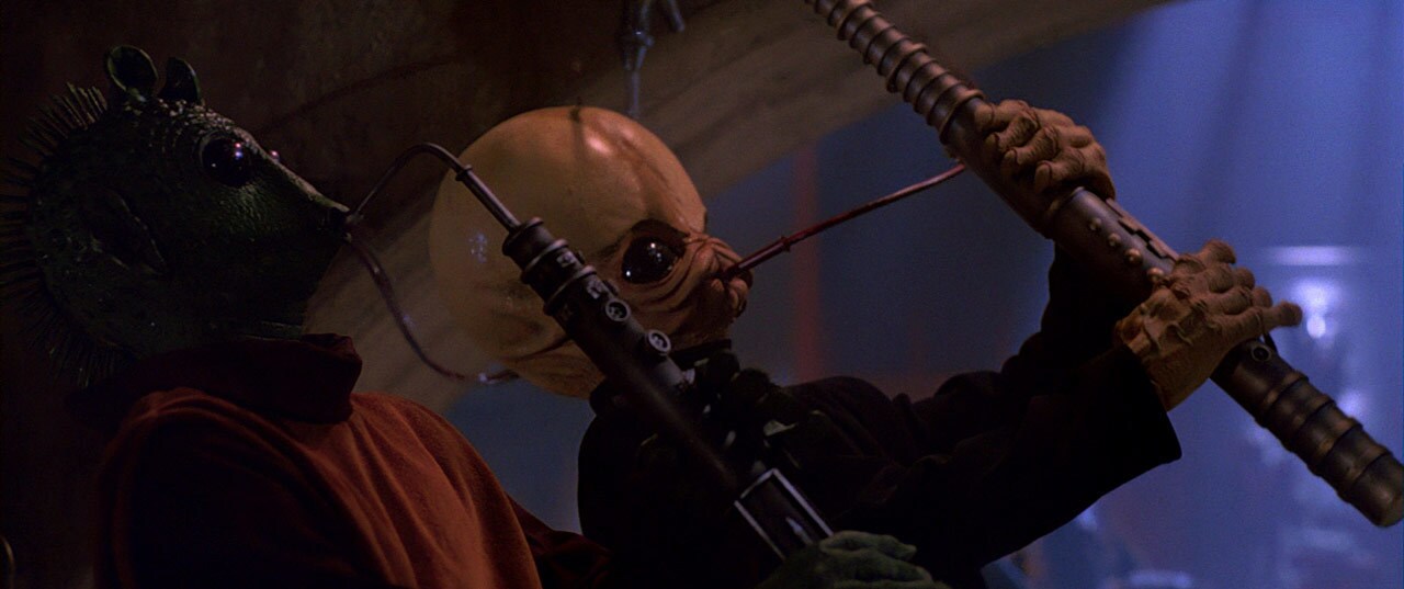Alien musicians play wind instruments in Jabba's palace.