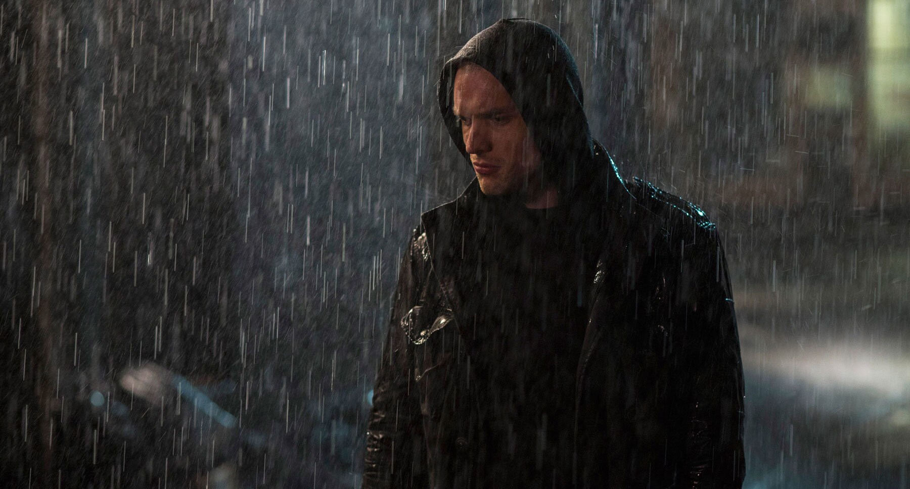 Ed Skrein (as Ajax) standing in the rain in "Deadpool"