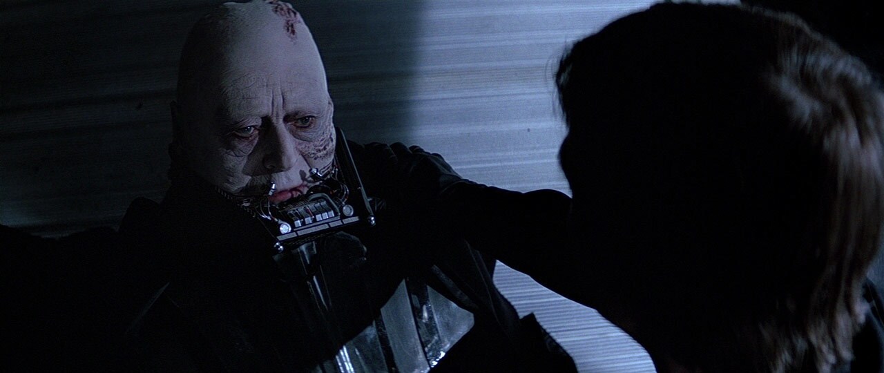 Darth Vader without his helmet, his face revealed as he speaks with Luke Skywalker in Star Wars: Return of the Jedi.