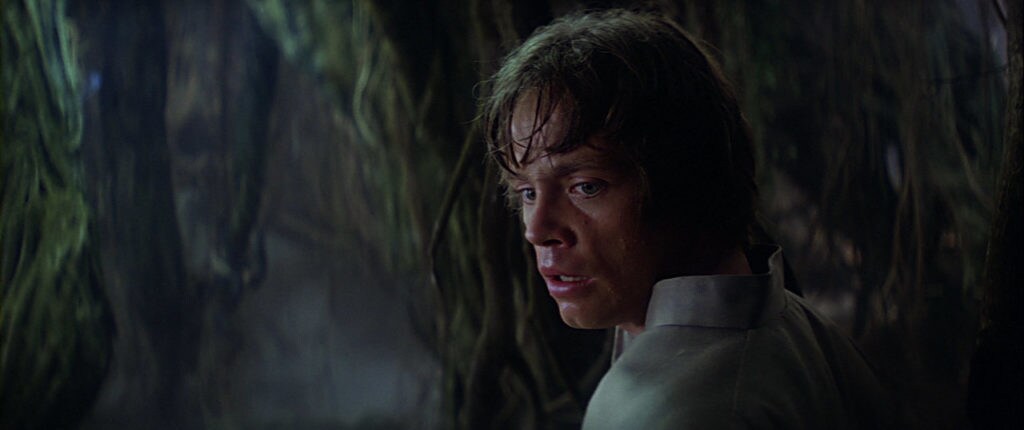 Luke Skywalker stands amid the swamp on Dagobah in The Empire Strikes Back.