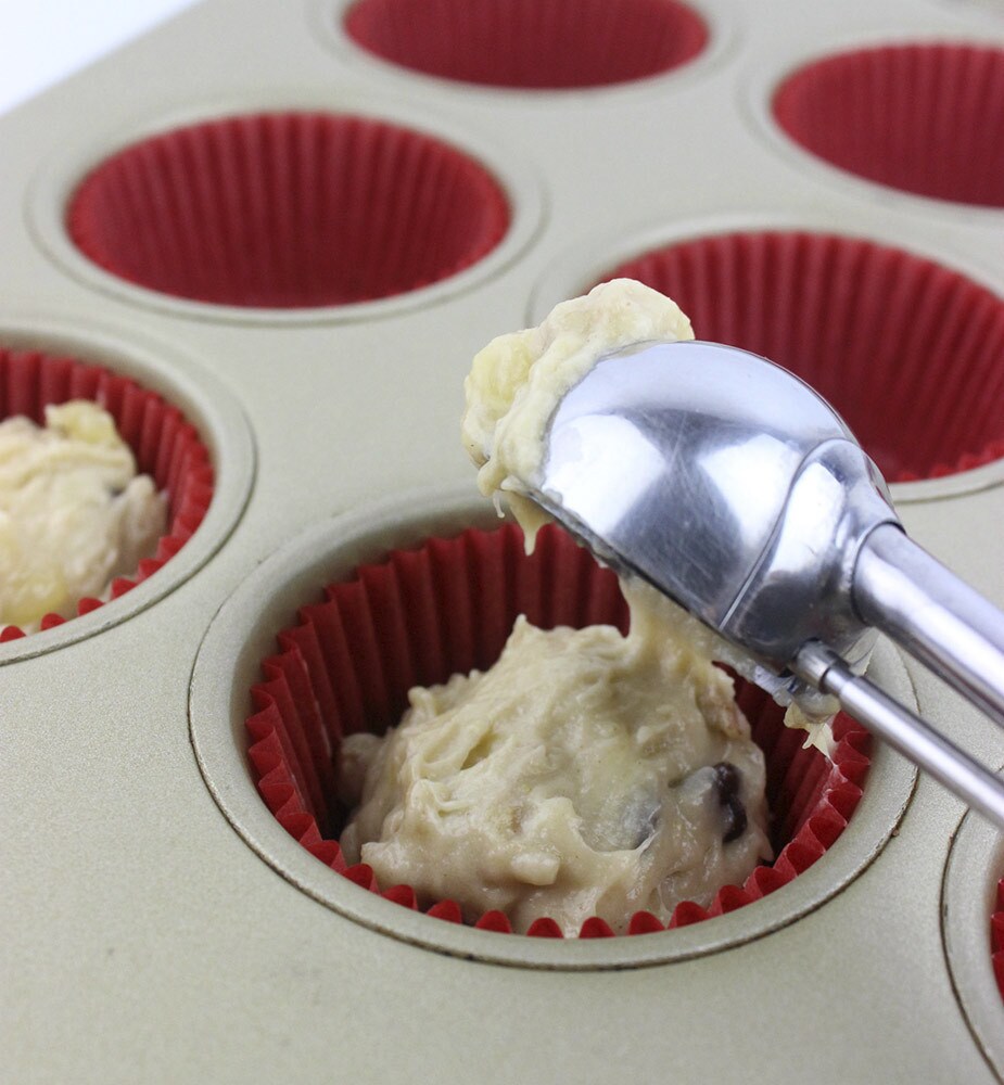 Spoon the batter into the prepped muffin tin for Boba Fett banana bread muffin