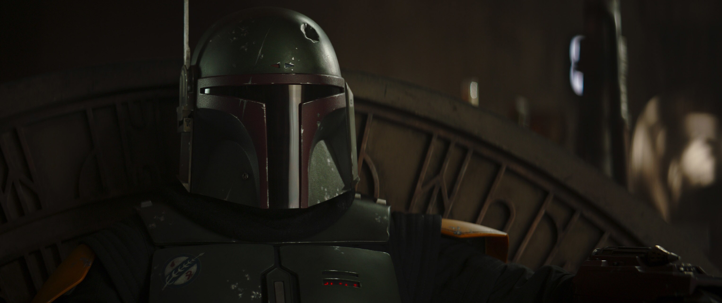 Boba Fett sits on a throne in The Book of Boba Fett trailer.