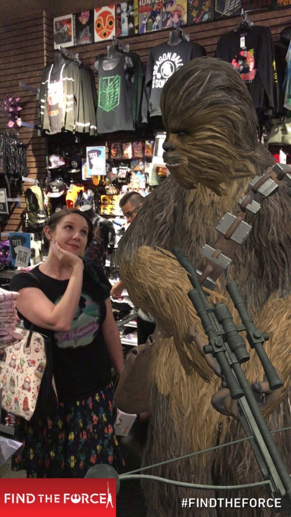 A computer generated Chewbacca at Hot Topic from Find the Force, an augmented reality scavenger hunt game with game player Amy Ratcliffe.