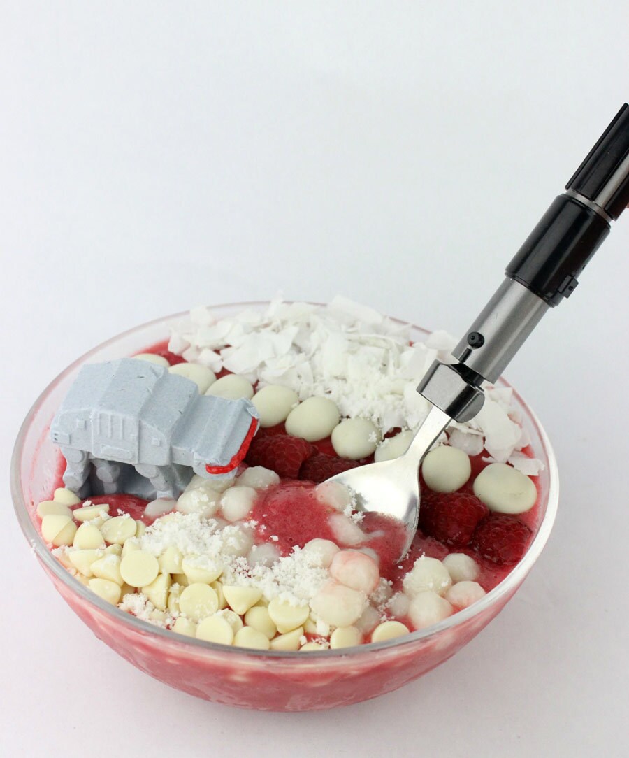 Crait smoothie bowl with a spoon and tiny Walker.
