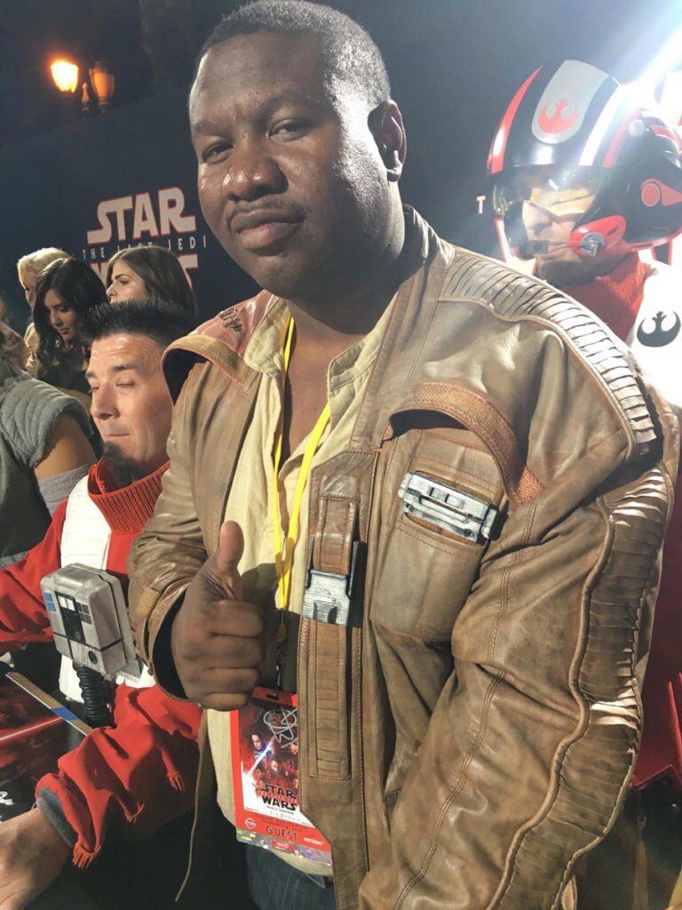 A Star Wars fan cosplays as Finn.