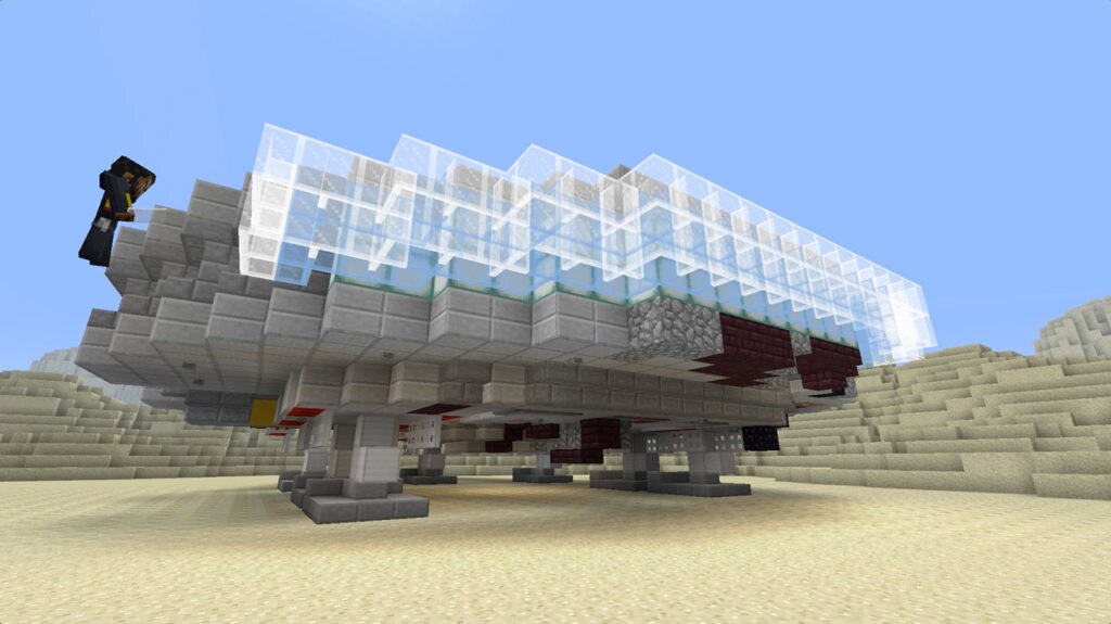 Glass is added to the back of a Minecraft Millennium Falcon to give the appearance of afterburners.