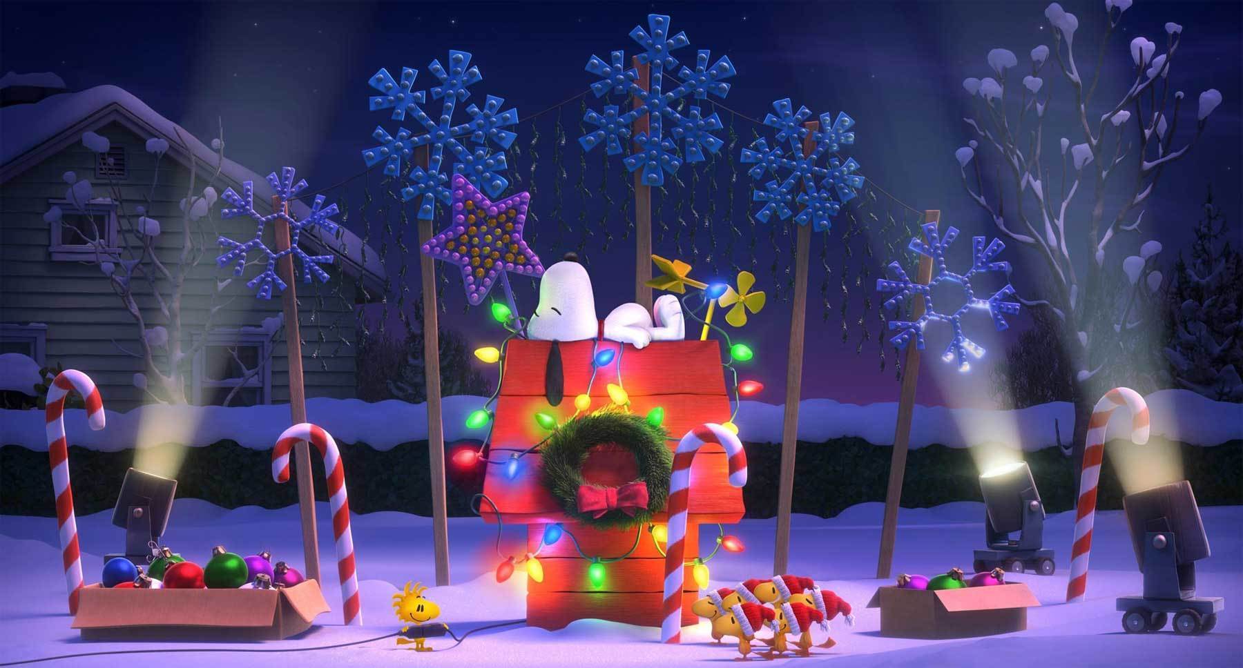 Snoopy and Woodstock (both voiced by Bill Melendez) lighting up Snoopy's doghouse in "The Peanuts Movie"