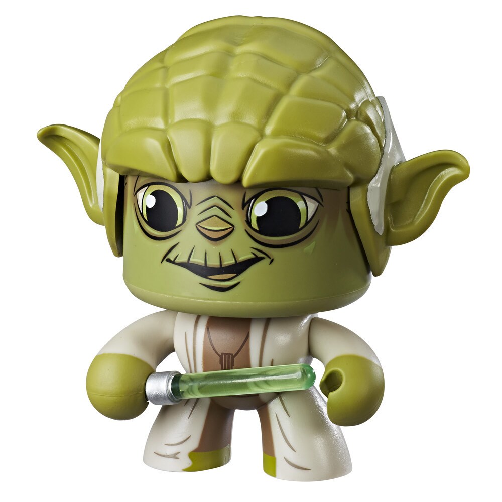 A Mighty Muggs Yoda figure smiles while holding a lightsaber.