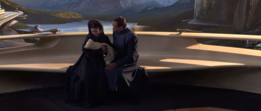 Breha and Bail Organa hold an infant Princess Leia in Revenge of the Sith.