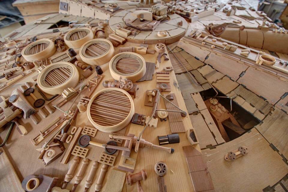 A close-up of various small wooden pieces that add details to the Millennium Falcon sculpture.