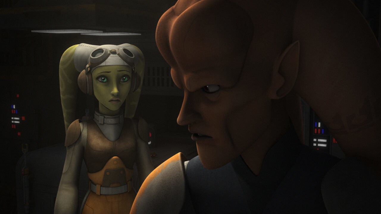 Cham looks over his shoulder at Hera while aboard the Ghost in Star Wars Rebels.
