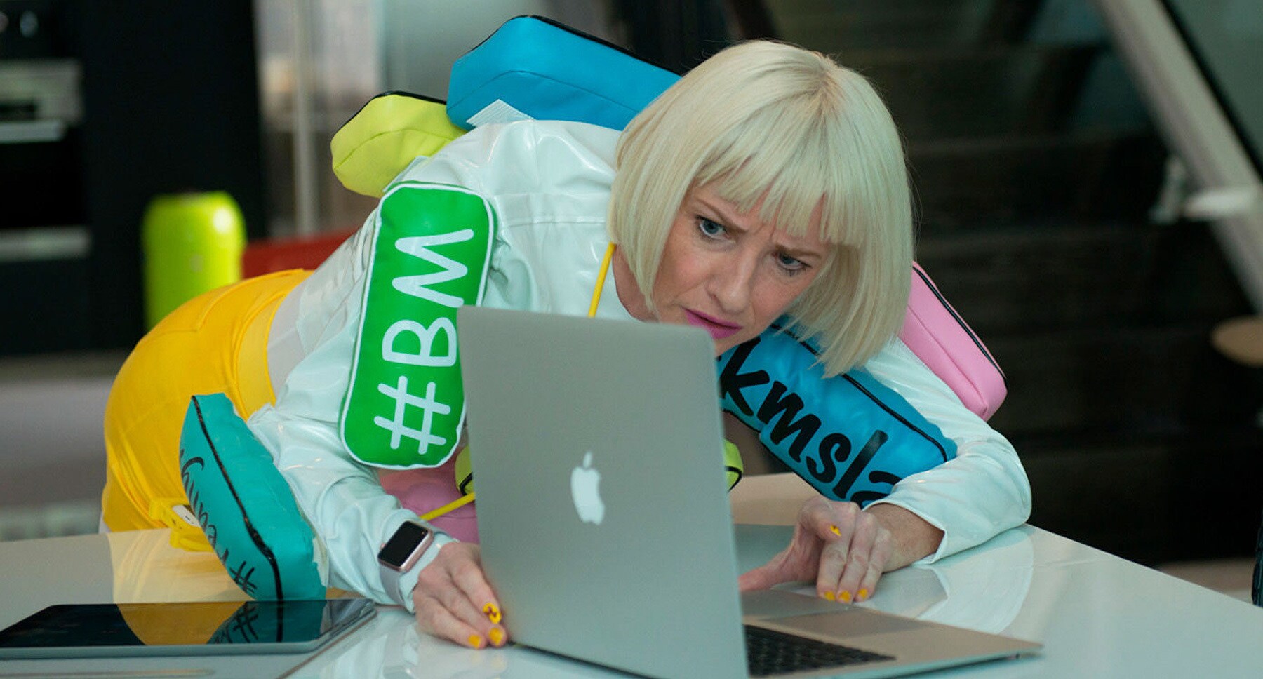 Actor Jane Horrocks (Bubble) looking at laptop in "Absolutely Fabulous: The Movie"