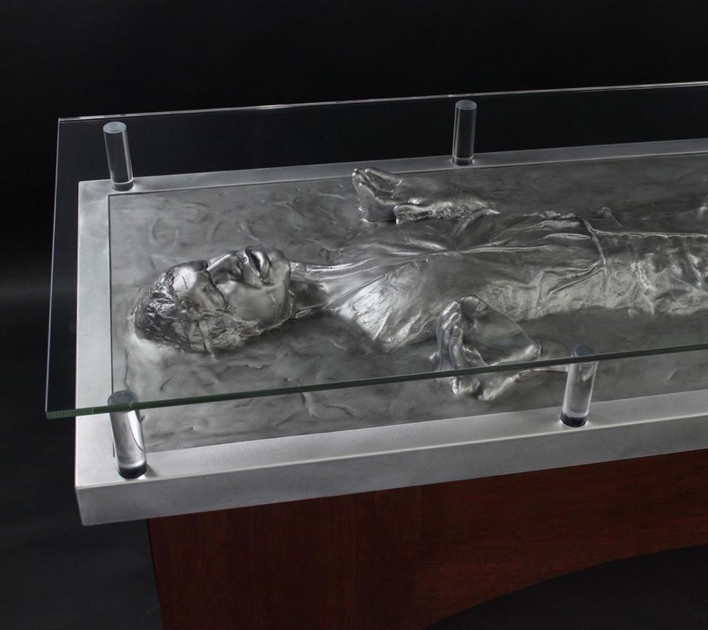 A desk modeled after Han Solo in carbonite.