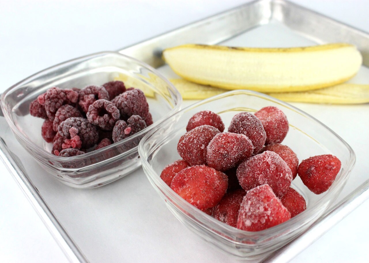 Raspberries, bananas, and strawberries for a Crait smoothie bowl.