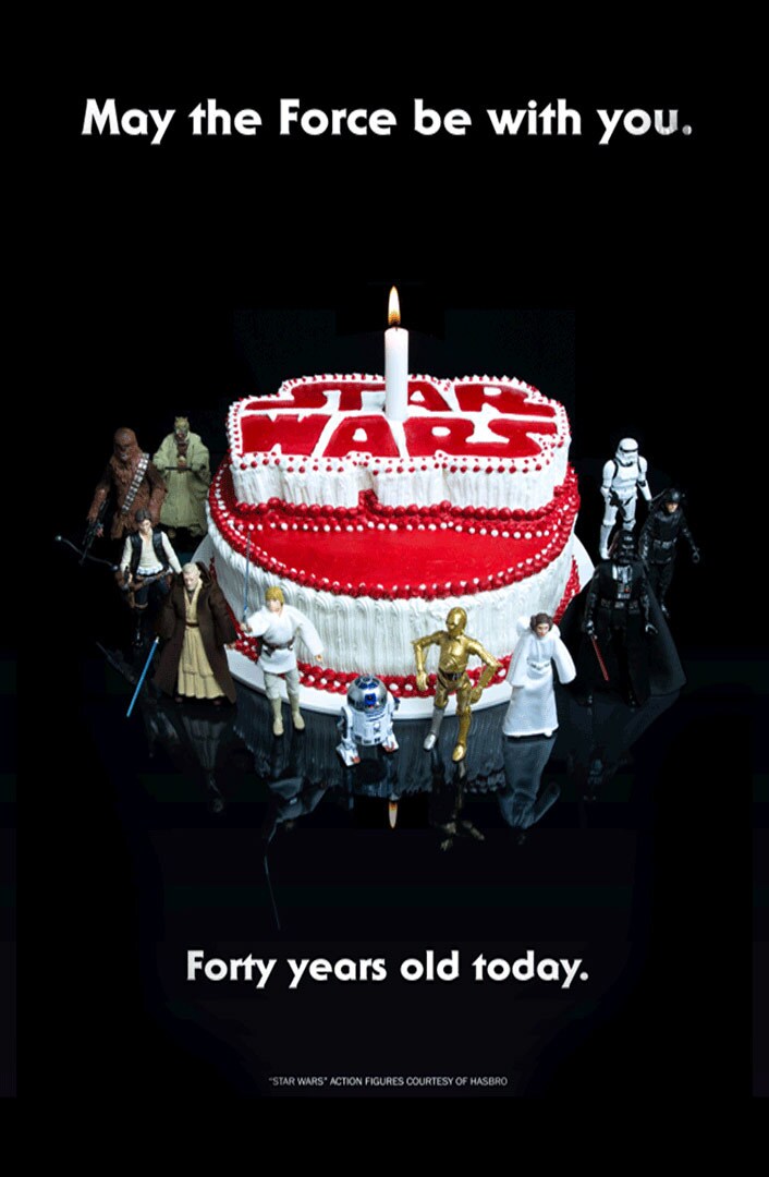 A Star Wars 40th Anniversary poster features a birthday surrounded by action figures.