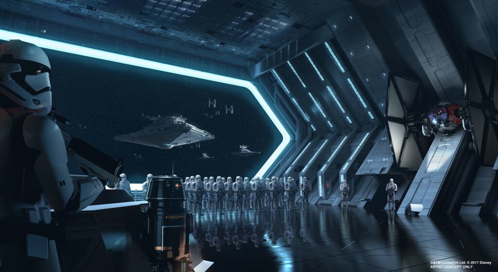 Stormtroopers stand in formation inside the hangar of a Star Destroyer in an image from the Rise of the Resistance attraction at Disney's Star Wars: Galaxy's Edge.