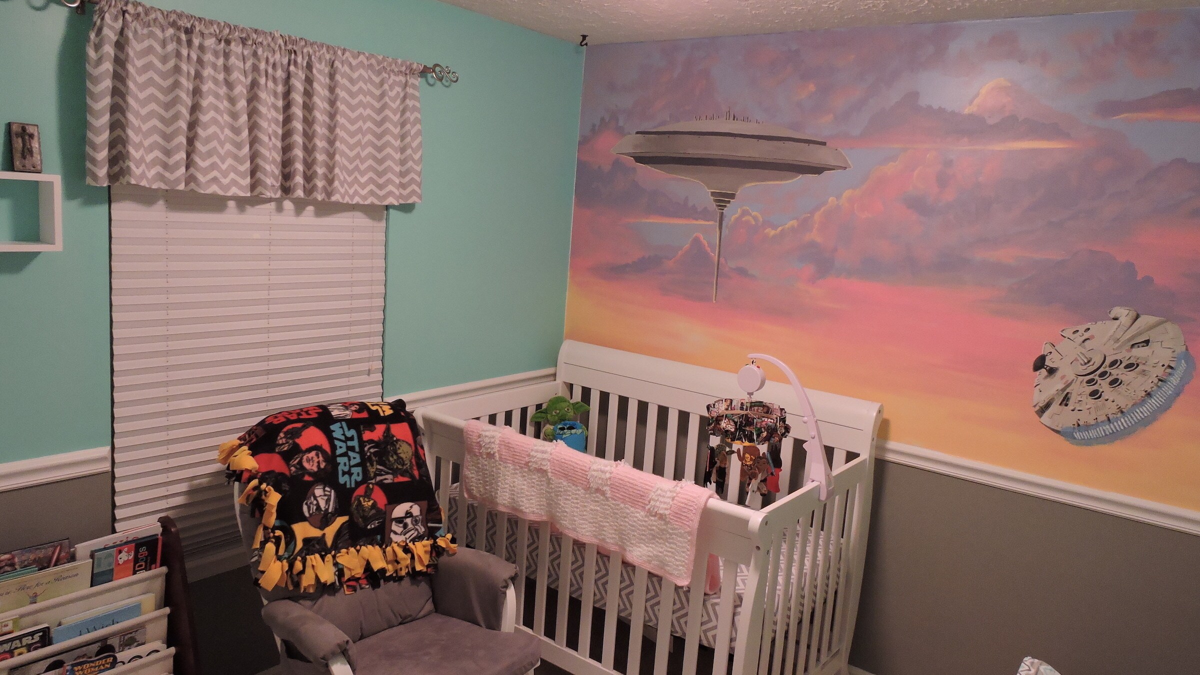 A shot of Tim Murphy's nursery focusing on the crib and rocking chair