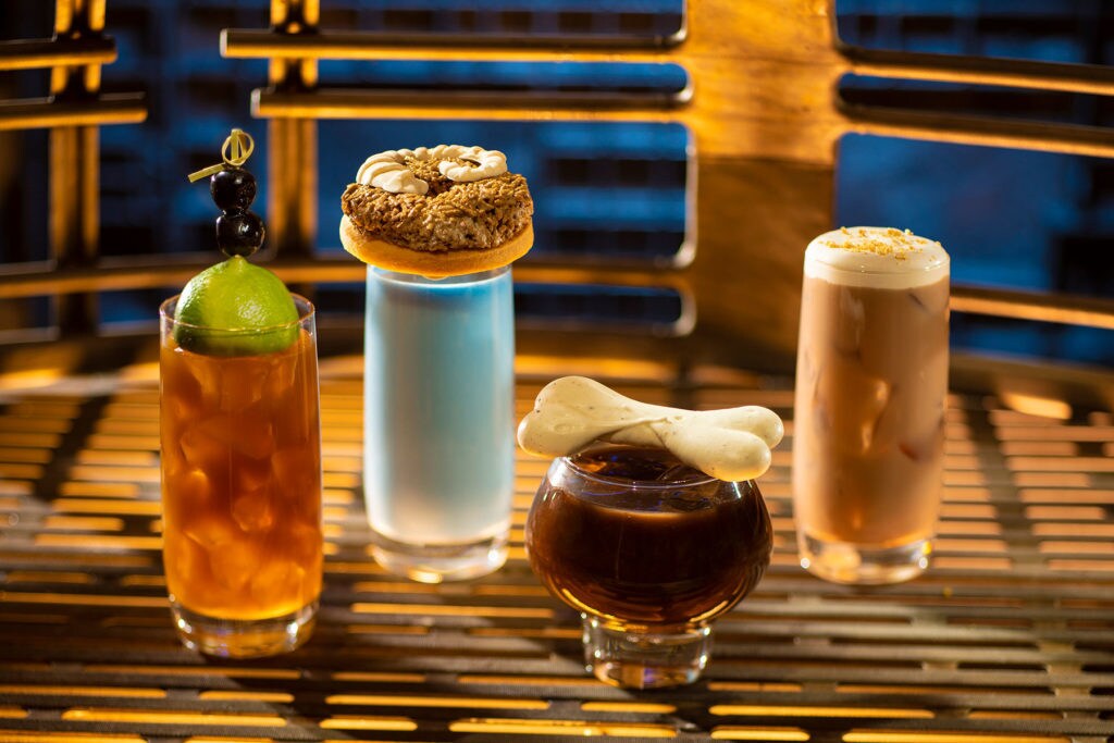 From left to right: Moogan Tea, Blue Bantha, Bloody Rancor (contains alcohol) and the Black Spire Brew can be found at Oga’s Cantina inside Star Wars: Galaxy’s Edge. (Kent Phillips/Disney Parks)
