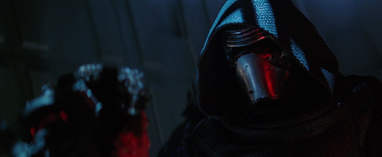 Kylo Ren wears his mask in The Force Awakens.
