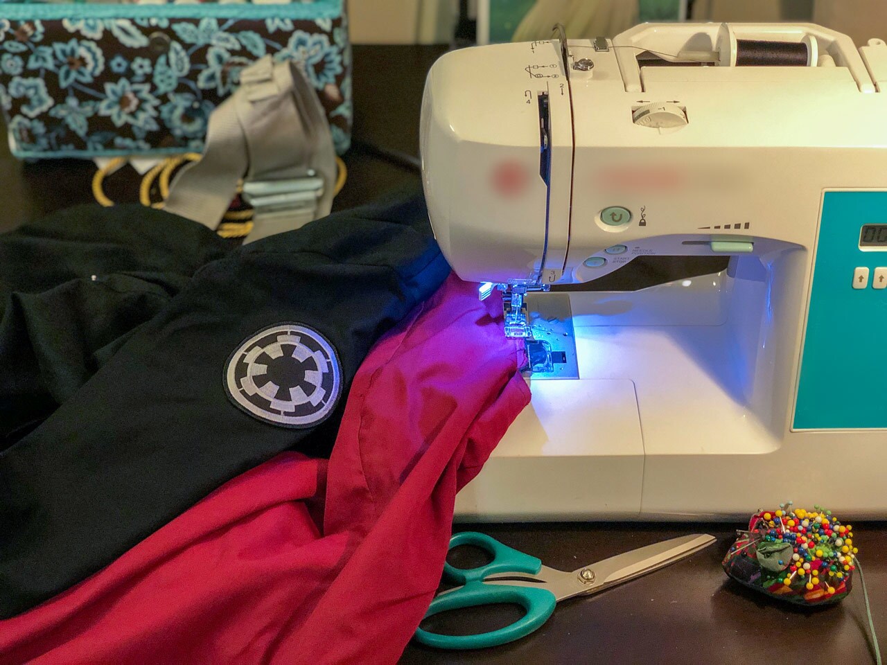 A First Order costume being sewn 