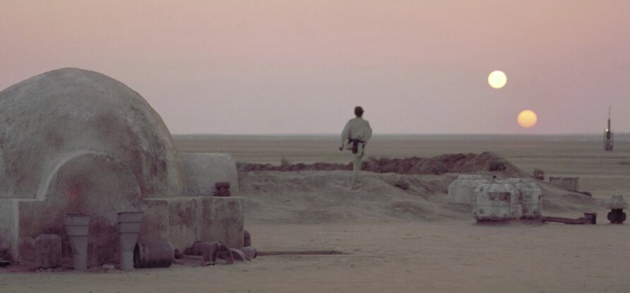 Luke Skywalker watches the binary sunset on Tatooine.