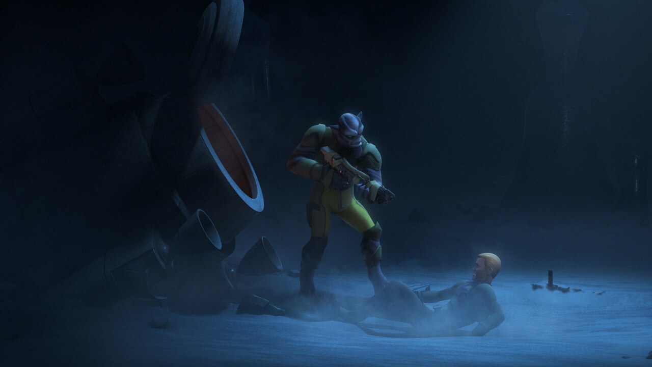 Kallus is held at gunpoint on the ground by Zeb Orrelios.